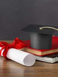 education-day-arrangement-with-graduation-cap